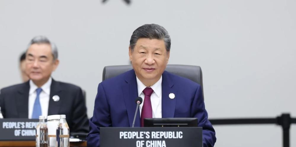 Xi